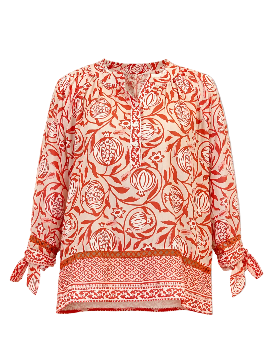 Red and white patterned blouse on a gray background