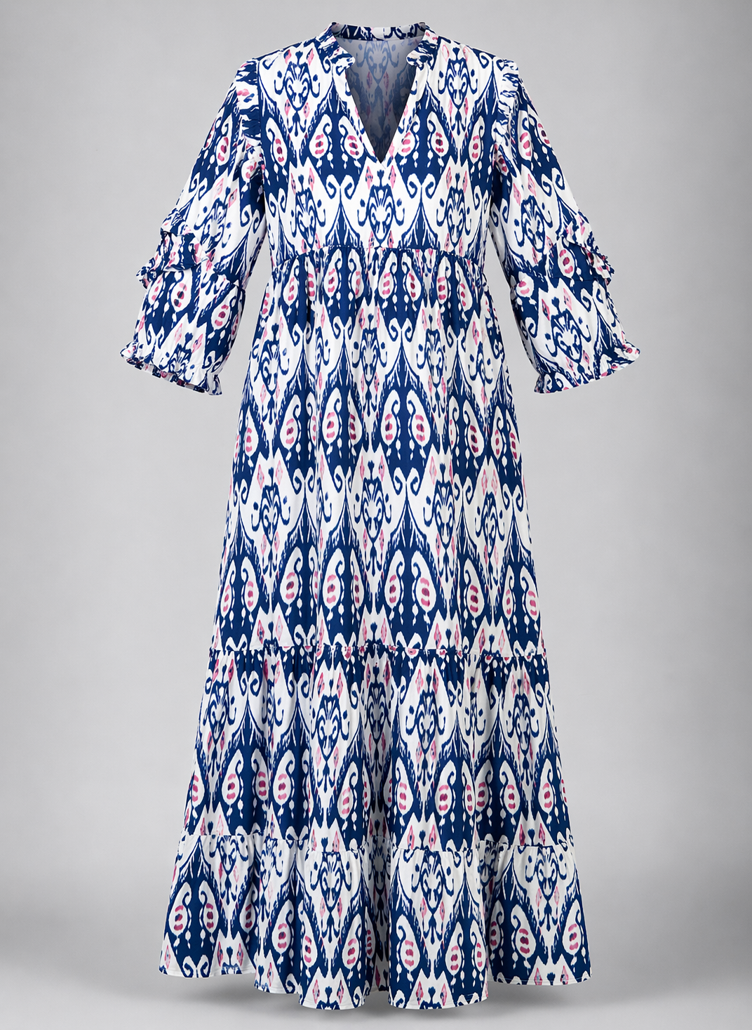 Long dress with a blue and white pattern on a gray background