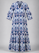 Long dress with a blue and white pattern on a gray background
